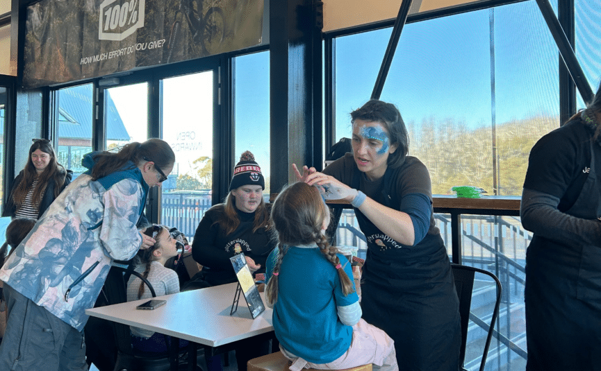 girl getting face painting