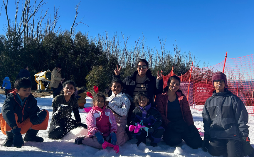 family enjoying the snow