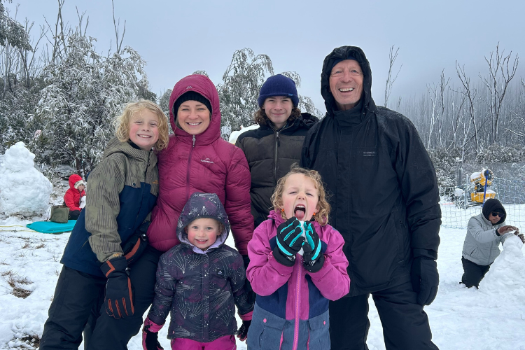 family in snow
